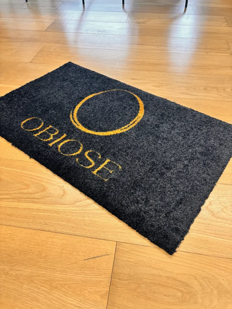 Obiose Waterloo – Tapis logo entrée parquet – DDC Design
